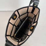 Black Glossy Woven Handbag — Modern structure with elevated shine