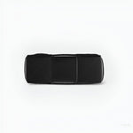 Black Glossy Woven Handbag — Modern structure with elevated shine