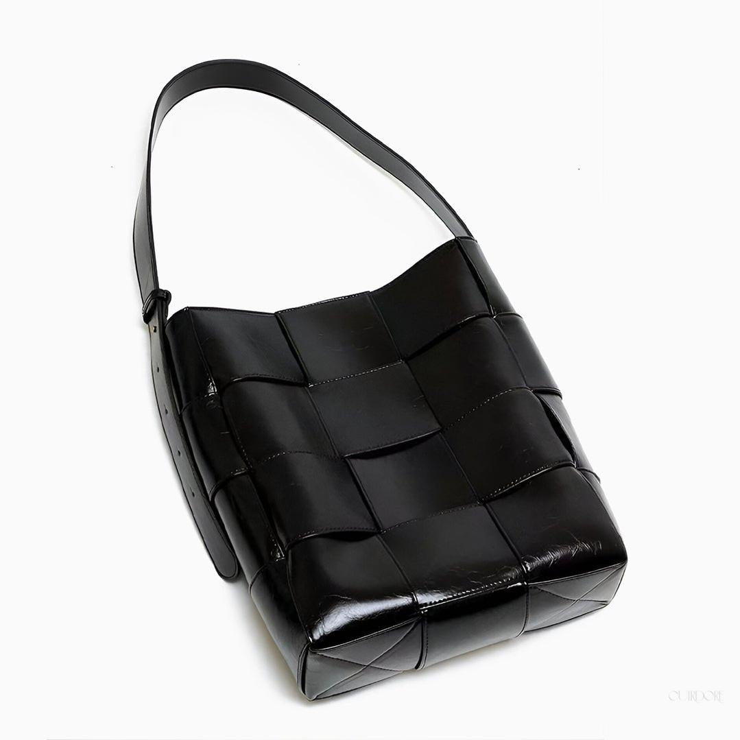 Black Glossy Woven Handbag — Modern structure with elevated shine