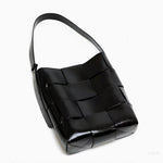 Black Glossy Woven Handbag — Modern structure with elevated shine