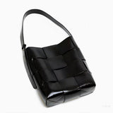 Black Glossy Woven Handbag — Modern structure with elevated shine