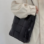 Black Glossy Woven Handbag — Modern structure with elevated shine