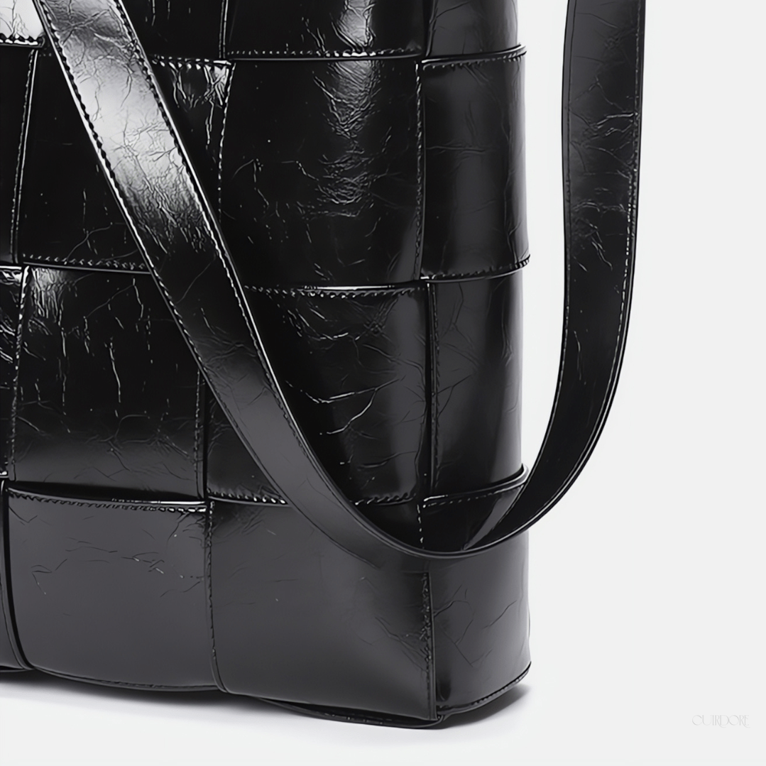 Black Glossy Woven Handbag — Modern structure with elevated shine