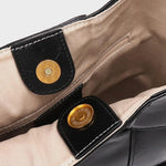 Black Glossy Woven Handbag — Modern structure with elevated shine