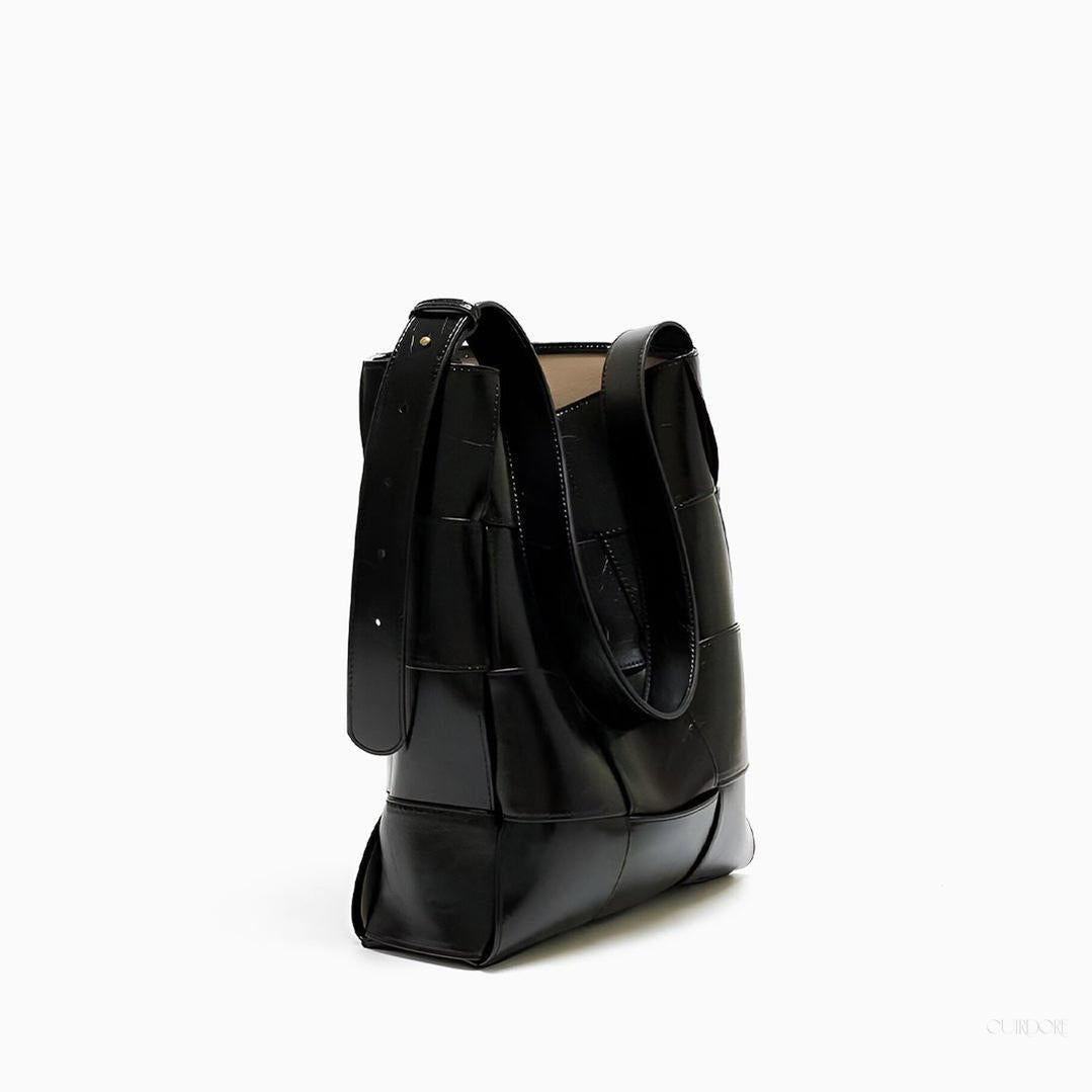Black Glossy Woven Handbag — Modern structure with elevated shine