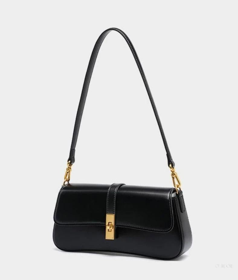 Elegant Baguette Handbag with Gold Lock Closure