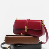 Elegant Baguette Handbag with Gold Lock Closure