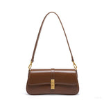 Elegant Baguette Handbag with Gold Lock Closure