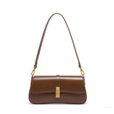 Elegant Baguette Handbag with Gold Lock Closure