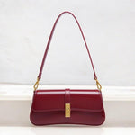 Elegant Baguette Handbag with Gold Lock Closure