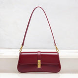 Elegant Baguette Handbag with Gold Lock Closure