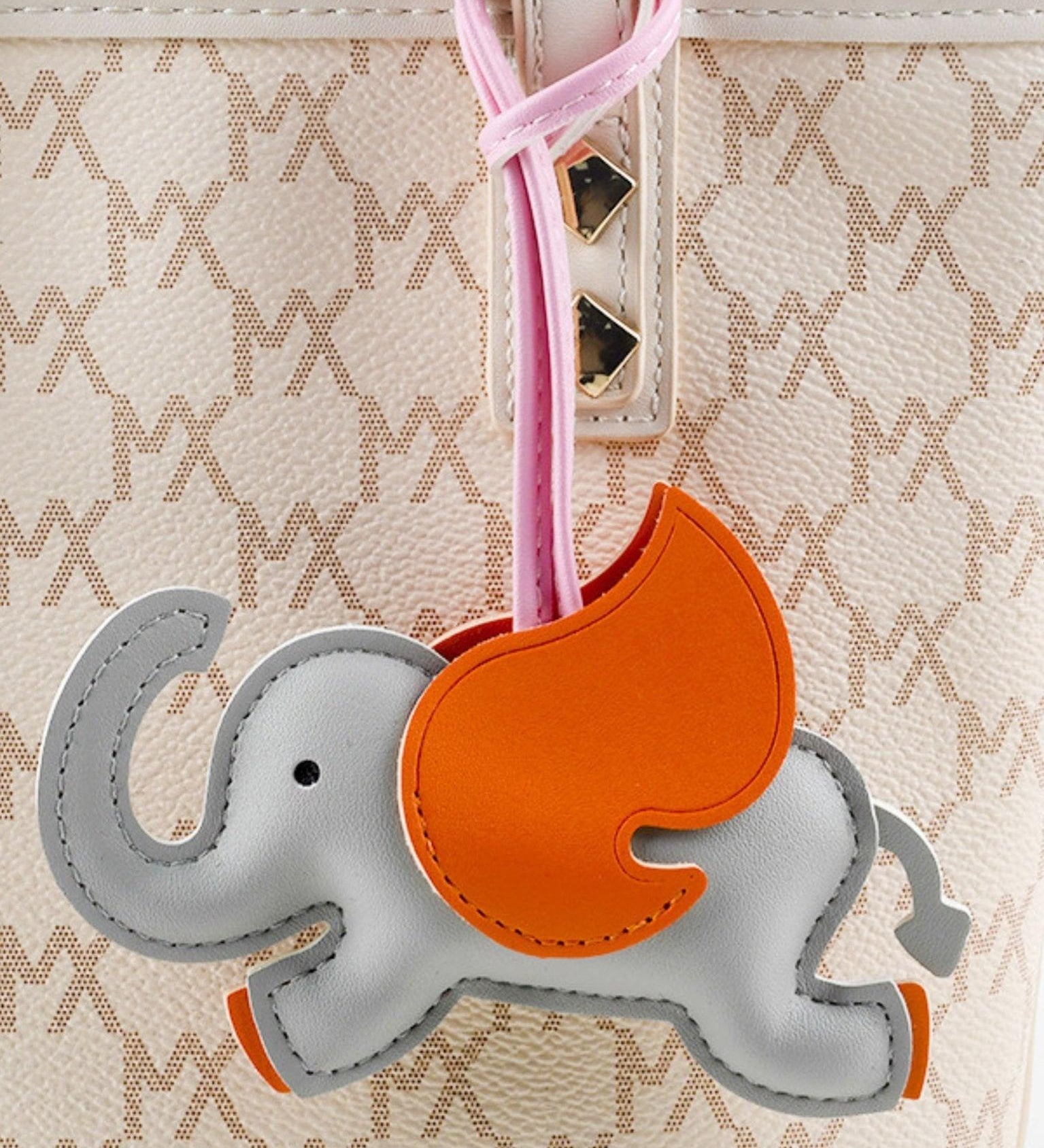Luthien Flying Elephant Leather Bagcharm – Whimsical Elegance & Playful Luxury