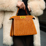 Tan Woven Leather Top Handle Handbag with Gold Lock